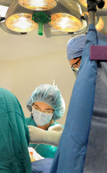 A surgical team in the operating room at Grady