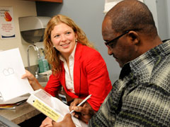 Dr. Patzer conducting a patient survey.